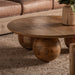 Bocksberg Coffee Table in natural brown color showcases a contemporary design that combines simplicity and functionality. Crafted from mango wood, this table offers both durability and a warm, natural aesthetic