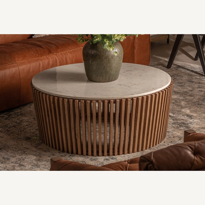 Elevate your living space with our exquisite Goms Coffee Table. Crafted with artful detail and luxury in mind, this table combines the finest acacia wood with a sleek marble surface. Its Art Deco style adds a touch of sophistication to any room