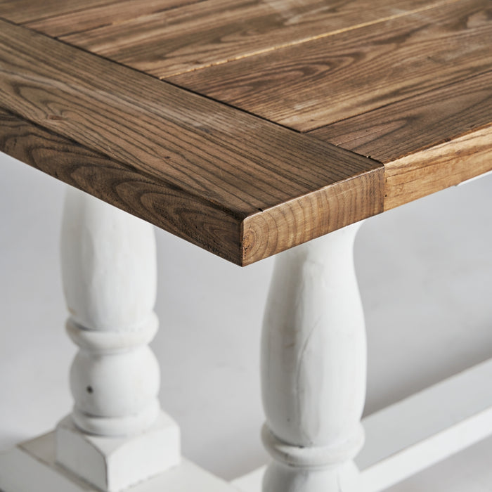 The Cirella Dining Table exudes the timeless charm of Provenzal style with its white and natural color palette. Crafted from recycled elm tree wood, this table embodies sustainability and eco-consciousness.