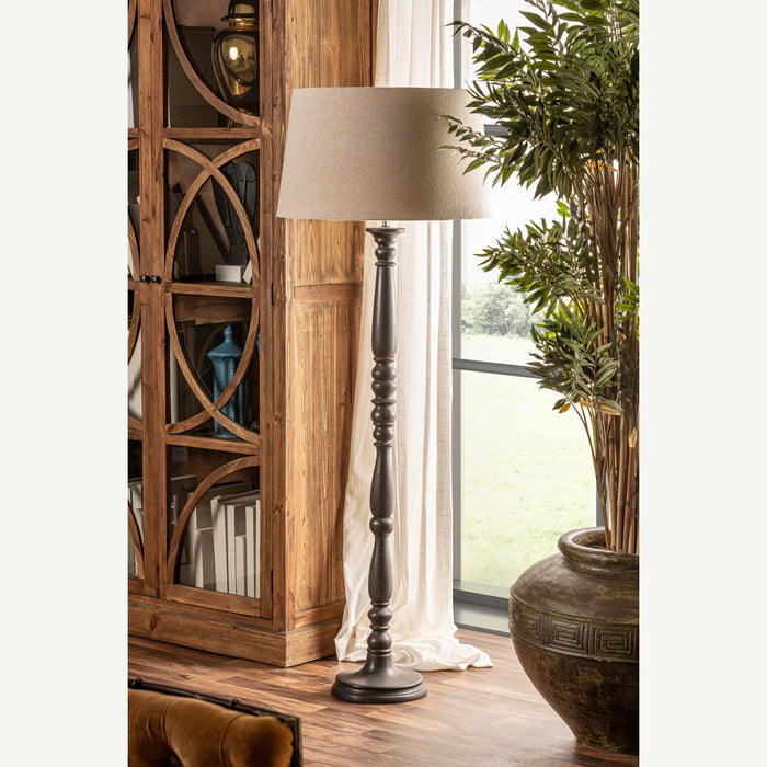 exquisite black Floor Lamp Teucrium. This Provenzal-style lamp features a sleek black color that effortlessly complements any interior decor. Crafted from premium mango wood, it showcases the beauty of natural materials and offers durability