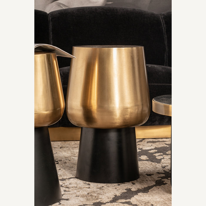 Introducing the Klam Side Table, a striking addition to your space in a captivating black & gold color combination. Embodying the timeless Art Deco style, this table is meticulously crafted from durable iron, ensuring both style and durability
