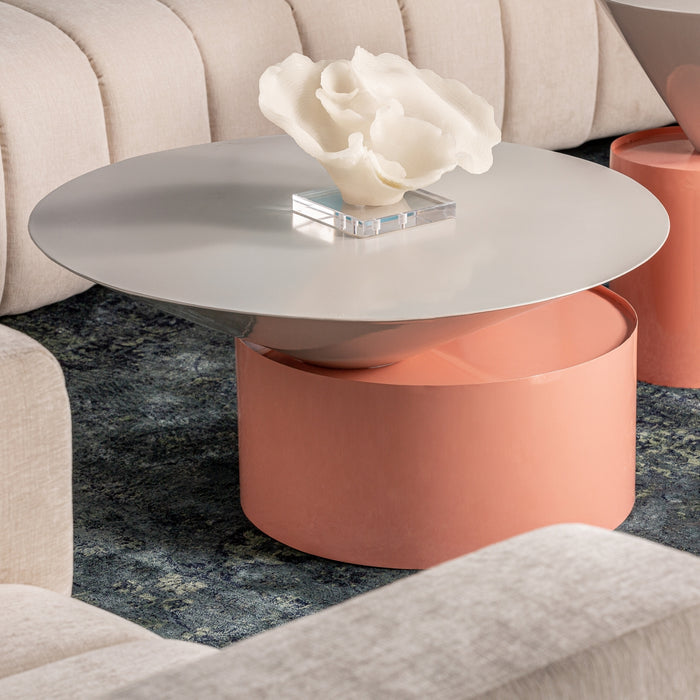 The Wil Side Table is a striking piece of furniture that embodies the Art Deco style with its blend of white and rosa colors. Made of iron, this side table offers durability and a sleek, modern aesthetic