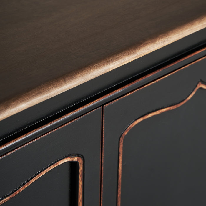The Jussac Sideboard exudes timeless elegance with its classic style and sleek black color. Crafted from a combination of mango wood and MDF, it offers durability and functionality