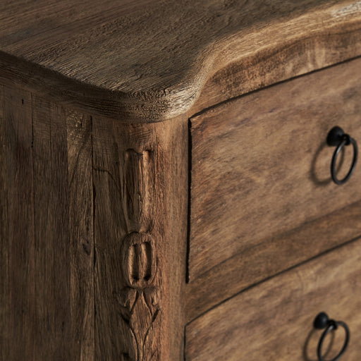 Moyaux sideboard, in a soothing natural shade, effortlessly channels the enduring charm of colonial design. Expertly crafted from solid mango wood, its intrinsic grain patterns and warmth are complemented by sturdy iron accents, offering a seamless blend of materials