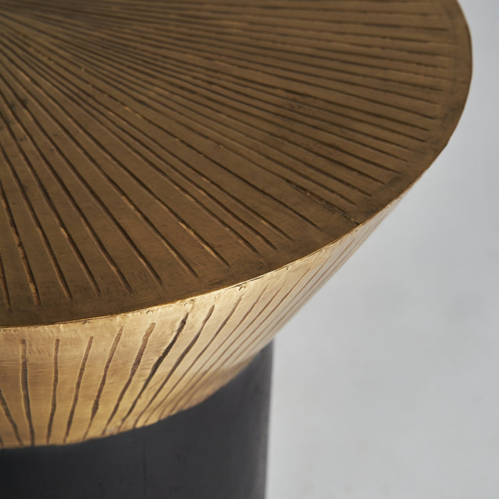 Bure Side Table showcases the opulence of Art Deco style with its striking Black & Gold color combination. Crafted with precision, this side table is made from high-quality brass and MDF materials
