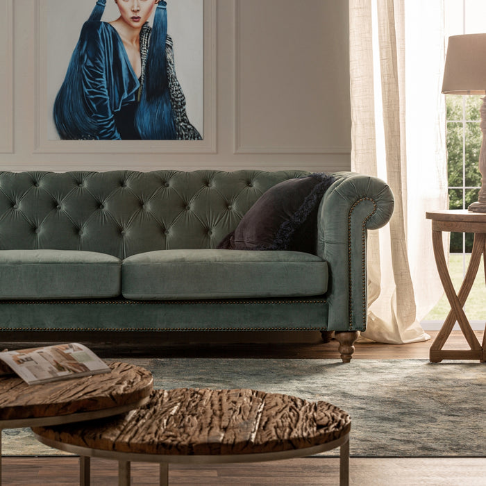 Experience the luxurious comfort of the buttoned Sofa Ersa, adorned in a captivating Turquoise color that adds a touch of sophistication to any living space. Crafted with meticulous attention to detail, this classic-style sofa is made of high-quality velvet upholstery, ensuring a soft and sumptuous seating experience