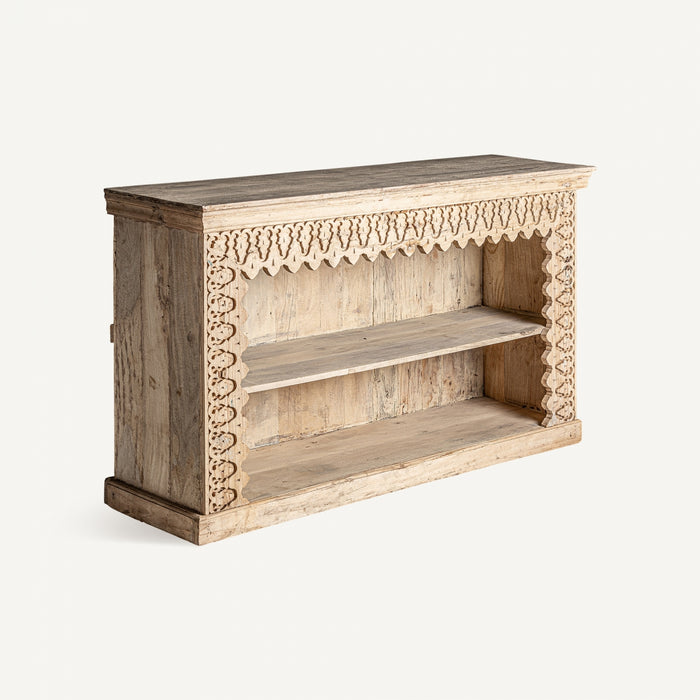 Tavel TV Stand showcases the beauty of ethnic style with its natural color and intricate design. Crafted with care, this TV stand is made entirely of mango wood, known for its durability and unique grain patterns