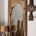 Handmade Mirror Argeen, made from teak wood and featuring an ethnic style with a natural color, is a true statement piece that will catch the eye of anyone who enters the room