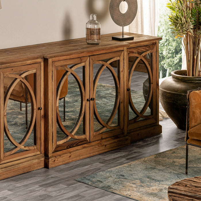 Presenting the Vichy Sideboard, a striking piece of colonial-style furniture that exudes elegance and sophistication. Crafted from recycled pine wood, this sideboard showcases a natural color that adds warmth to any interior