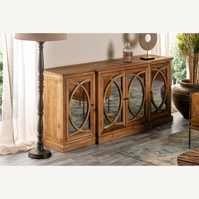 Presenting the Vichy Sideboard, a striking piece of colonial-style furniture that exudes elegance and sophistication. Crafted from recycled pine wood, this sideboard showcases a natural color that adds warmth to any interior