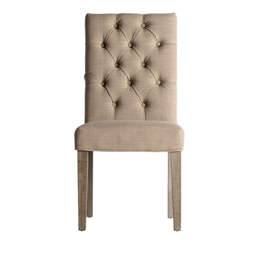 The Isere chair, in a warm ochre shade, epitomizes the pastoral allure of Provenzal design. Thoughtfully constructed from MDF and rubber wood, it's upholstered with soft cotton, blending comfort with rustic charm