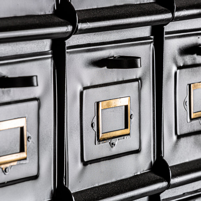 Add a touch of industrial elegance to your space with the Lomza Multi Chest Of Drawers in striking Negro color. This unique piece is meticulously crafted from durable wrought iron, ensuring both style and longevity