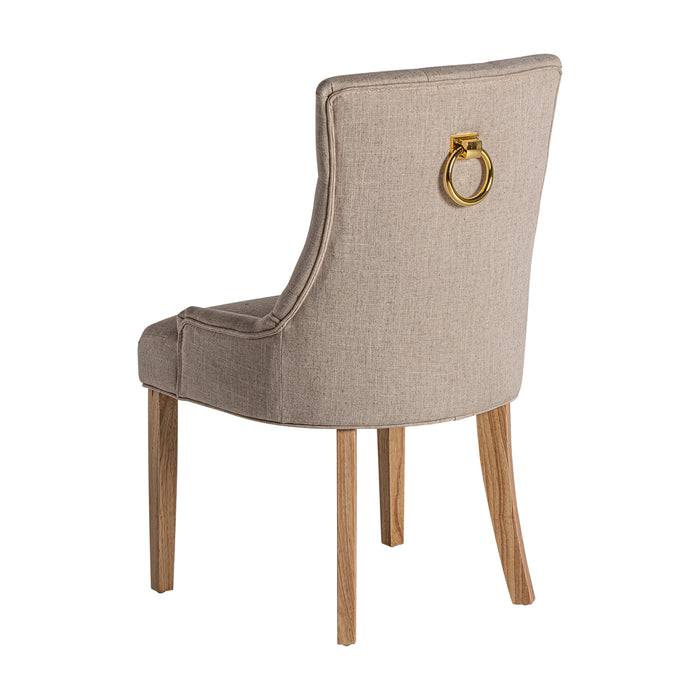 The Aisne chair, in a serene crema hue, beautifully captures the rustic charm of Provenzal design. Carved from genuine firwood and adorned with a blend of soft cotton and polyester, it offers a harmonious fusion of comfort and countryside elegance