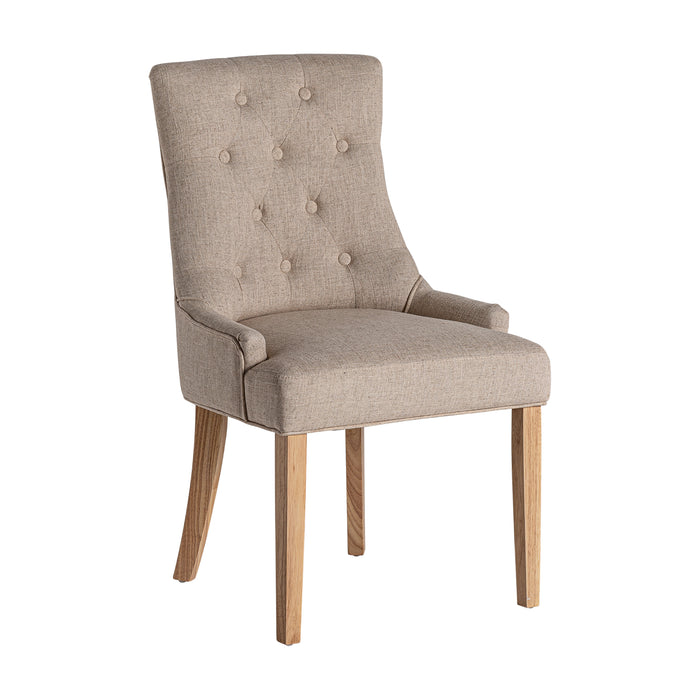 The Aisne chair, in a serene crema hue, beautifully captures the rustic charm of Provenzal design. Carved from genuine firwood and adorned with a blend of soft cotton and polyester, it offers a harmonious fusion of comfort and countryside elegance