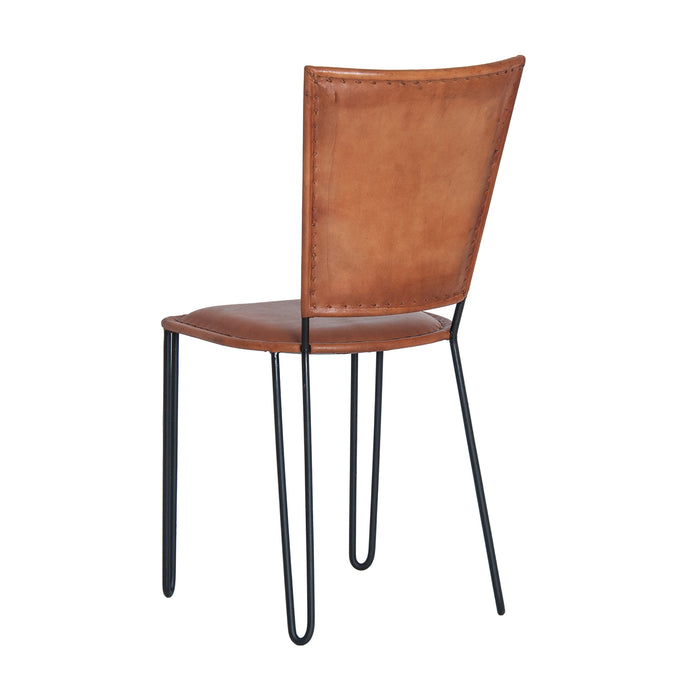 Chair Liverpool, in a deep brown shade, captures the nostalgic allure of vintage design. Forged from durable iron and cloaked in sumptuous goat leather with a cushioned foam layer, it ensures both longevity and unparalleled comfort