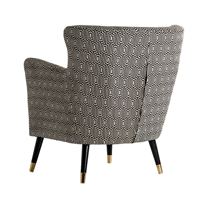 The Yeovil Armchair, featuring a vintage style with a luxurious black, white, and gold color scheme, is a true eye-catcher