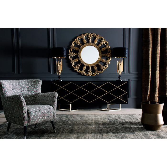 Elegant room design with Armchair Yeovil, featuring a vintage style with a luxurious black, white, and gold color scheme, is a true eye-catcher