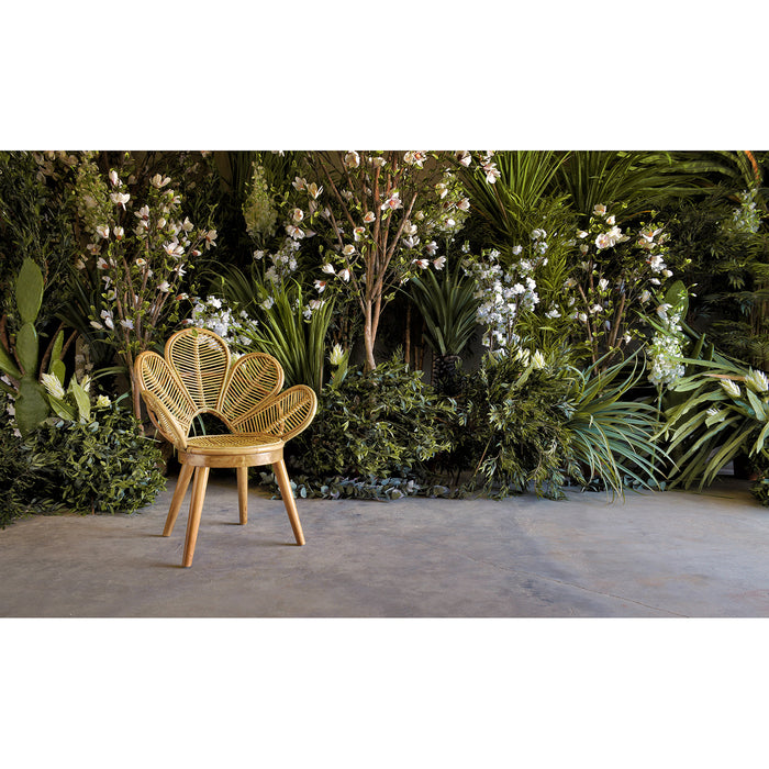 The Lluc armchair, in a refined natural shade, epitomizes the clean lines and elegance of contemporary design. Masterfully constructed from rattan, complemented by sturdy mahogany wood, and cushioned with soft cotton, it strikes a balance between form and function