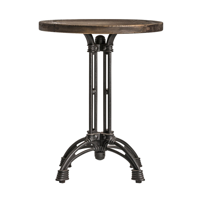 Round Buckie Bar Table, with its striking black and natural tones, captures the raw essence of industrial design. Its robust iron framework harmoniously complements the reclaimed beauty of elm tree wood, showcasing a sustainable touch