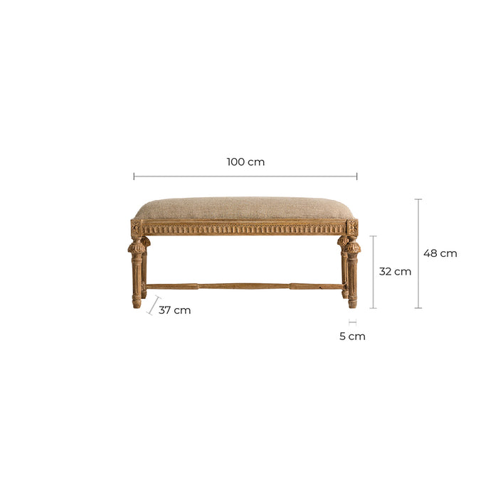 The Nargis bed foot stool, draped in a serene beige hue, epitomizes the bucolic charm of Provenzal design. Delicately crafted from mango wood and upholstered with a refined blend of cotton and linen, it offers a union of texture and comfort