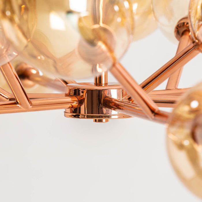 Ixia Ceiling Lamp, an exquisite blend of Art Deco style and modern elegance. Crafted with meticulous attention to detail, it features a stunning copper color that adds warmth and sophistication to any space. Made from high-quality brass and adorned with crystal accents, it exudes a luxurious charm