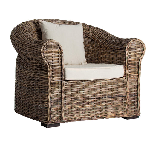 Ozieri armchair, presented in a serene natural hue, exemplifies the minimalist elegance of contemporary design. Expertly crafted from rattan and complemented with plush cotton, it offers a harmonious blend of texture and comfort
