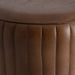 Stool Seney radiates a rich brown tone, capturing the timeless allure of vintage style. Constructed from sturdy iron, its seating is adorned with supple goat leather for added elegance. The fusion of materials delivers both durability and a classic aesthetic