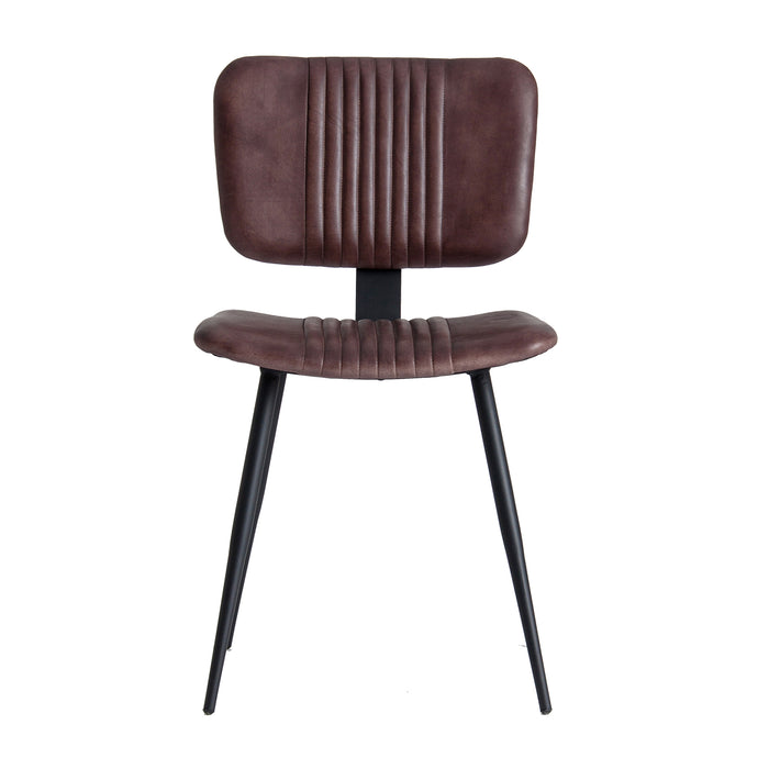 Chair Denby, in a rich brown hue, harks back to the classic charm of vintage design. Crafted from sturdy iron and adorned with luxurious goat leather, it merges durability with tactile opulence. This leather chair not only exudes timeless appeal but also promises to be a lasting centerpiece in any decor