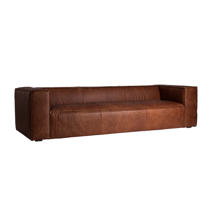 Kurza collection sofa and armchair are two pieces notable for their simplicity, but they are eye-catching at the same time; wherever you place them, they add personality to your room. They are made of cowhide, along with fir tree wood and foam, and the chocolate brown color is the hallmark of this collection