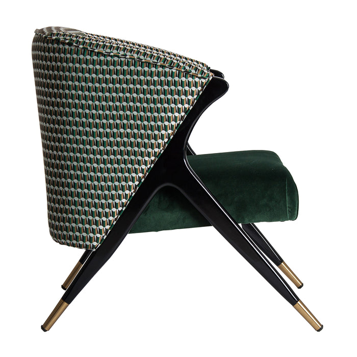 The Kelheim Armchair is a luxurious statement piece that combines pine and rubber wood with plush velvet to create a stunning piece of furniture. Its bold green color and contemporary design make it a standout addition to any living space seeking a touch of opulence