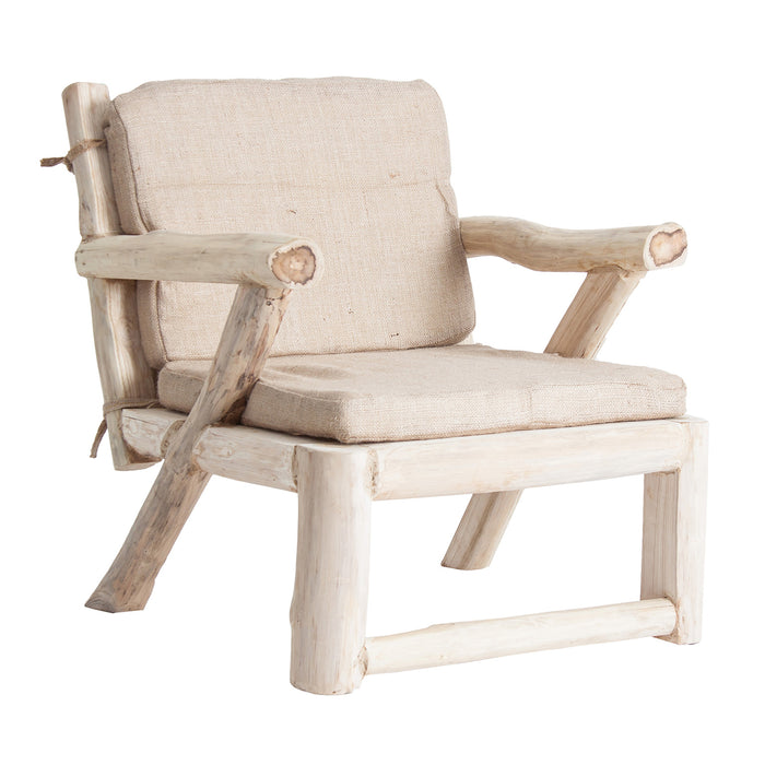 Indulge in the rustic charm of the Kibray Armchair. Its natural distressed color exudes a warm and inviting ambiance, while the contemporary design adds a touch of modernity