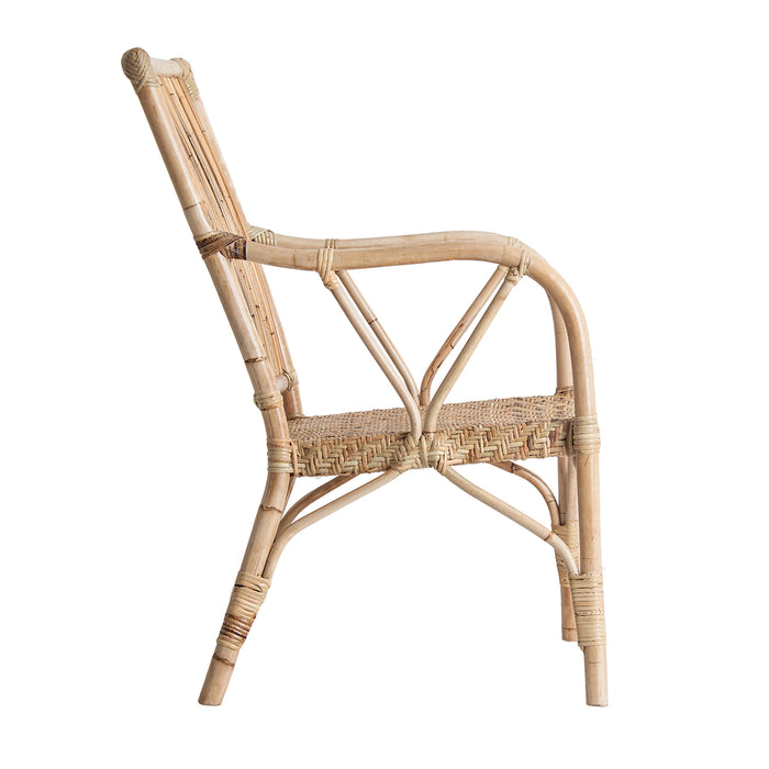 The Nukus armchair, in its pure natural shade, embodies the essence of modern design with an earthy touch. Entirely crafted from rattan, it stands as a tribute to simplicity and organic beauty. Representing pure nature furniture, this piece seamlessly integrates into contemporary settings while bringing forth the warmth and authenticity of its material
