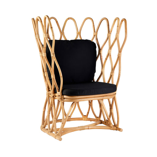 Introducing the striking and eye-catching Armchair CIENIA, a true statement piece that embodies modern elegance. Crafted from natural Rattan, this armchair is perfect for contemporary living spaces, bringing a touch of the outdoors inside