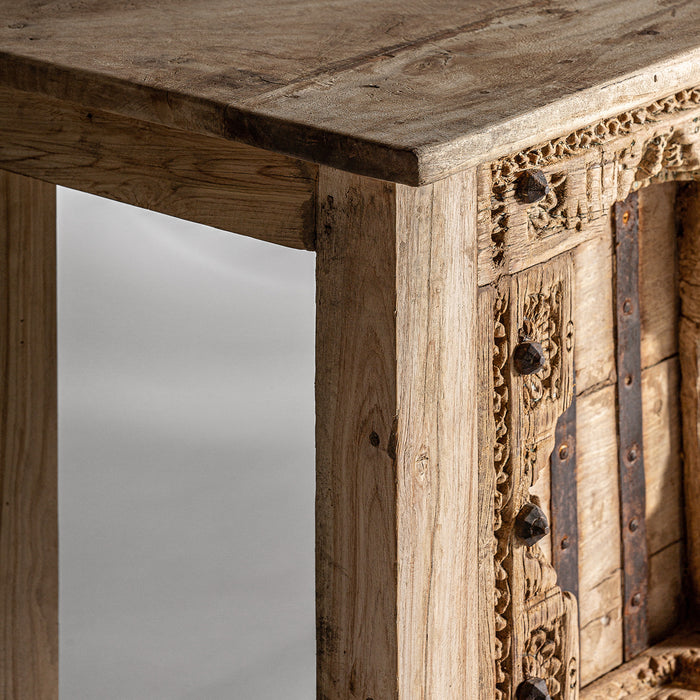 Crafted entirely by hand from pure teak wood and mango wood, the Chiayi Console Table embodies the beauty of pure nature with its natural color and ethnic style, showcasing intricate hand-carved details that add to its unique charm