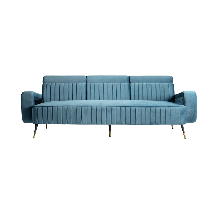 The Sladki Sofa features a striking blue color and a captivating kitsch style. It is constructed with a durable iron frame and upholstered in luxurious velvet fabric