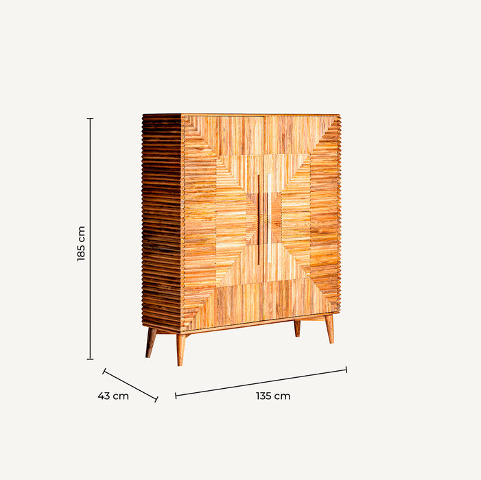 The Plissé Wood Wardrobe in a natural color exudes the timeless charm of Art Deco style. Constructed with premium mango wood and adorned with iron elements, it showcases a combination of beauty and sturdiness.