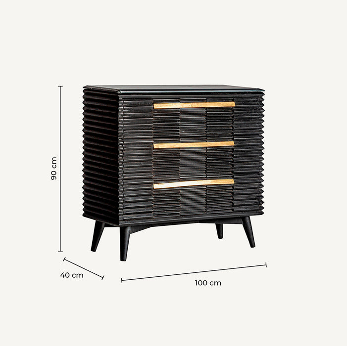 The Plissé Wood Chest of Drawers in a sleek black color embodies the luxurious Art Deco style. Meticulously crafted from high-quality mango wood, it features exquisite marble accents and iron detailing for a touch of elegance