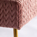Esine bed foot stool, bathed in a plush pink hue, encapsulates the grandeur of the Art Deco era. Adorned in sumptuous velvet and supported by a sturdy combination of steel and MDF, it offers both opulence and structural integrity