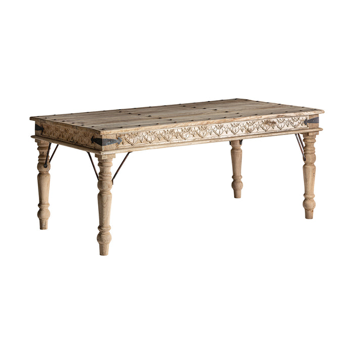 Betan Dining Table showcases the natural beauty of Mango Wood in an authentic Ethnic Style. Crafted with meticulous attention to detail, this wooden furniture piece exudes a rustic charm and brings a touch of warmth to any dining area