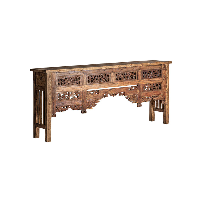 Crafted entirely by hand from pure teak wood and mango wood, the KIDAU Console Table embodies the beauty of pure nature with its natural color and ethnic style, showcasing intricate hand-carved details that add to its unique charm
