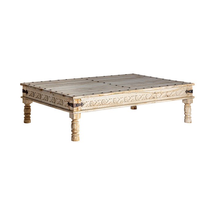 Embrace the enchanting allure of ethnic design with the Chizhia Coffee Table. Its cream color radiates a sense of tranquility and harmony, reflecting the essence of ethnic style. Meticulously crafted from mango wood, this table showcases the beauty of natural wooden furniture