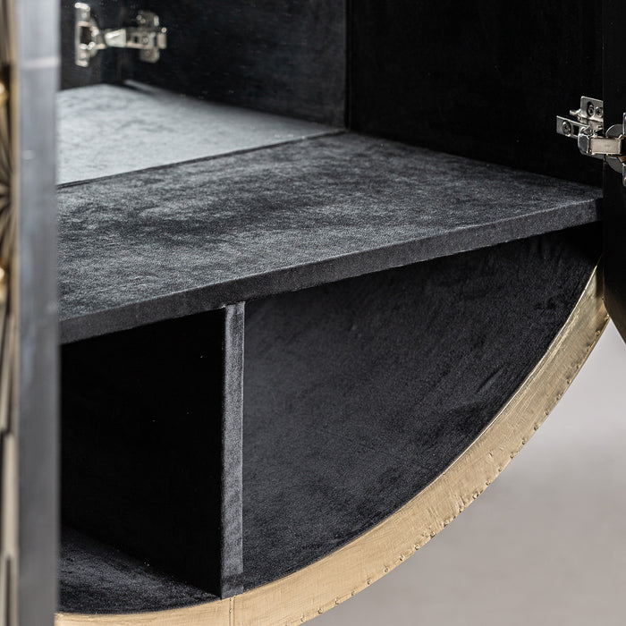 This luxurious Art Deco style Bar Cabinet from the Gatsby Collection is sure to be an eye-catcher with its stunning Black &amp; White &amp; Gold colours. Elevate your home with a touch of sophistication and exclusivity. Adorned with the finest materials of bone, Mdf, and iron, this Bar Cabinet from the Gatsby Collection is a true masterpiece of Art Deco design