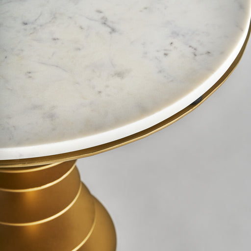 Art Deco-inspired Lauw Side Table in White & Gold color. This exquisite piece of furniture is crafted from a combination of strong iron and luxurious marble, ensuring both durability and elegance