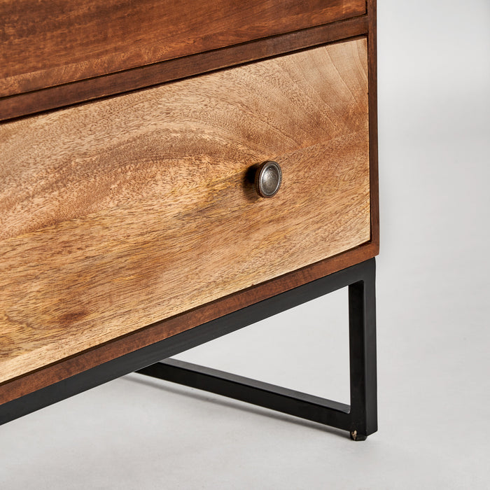 The Chest of Drawers Texas is a beautiful and practical piece of furniture that brings a touch of Nordic elegance to any living space. Crafted from high-quality mango wood and iron, this chest of drawers is built to last and provides ample storage space for all your essential