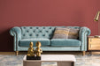 Experience the luxurious comfort of the buttoned Sofa Ersa, adorned in a captivating Turquoise color that adds a touch of sophistication to any living space. Crafted with meticulous attention to detail, this classic-style sofa is made of high-quality velvet upholstery, ensuring a soft and sumptuous seating experience