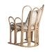 The Chair ARZANA in natural color is a unique and handcrafted piece of furniture that combines contemporary style with traditional materials. Made of rattan, cotton, and polyester, it exudes warmth and comfort while showcasing expert craftsmanship