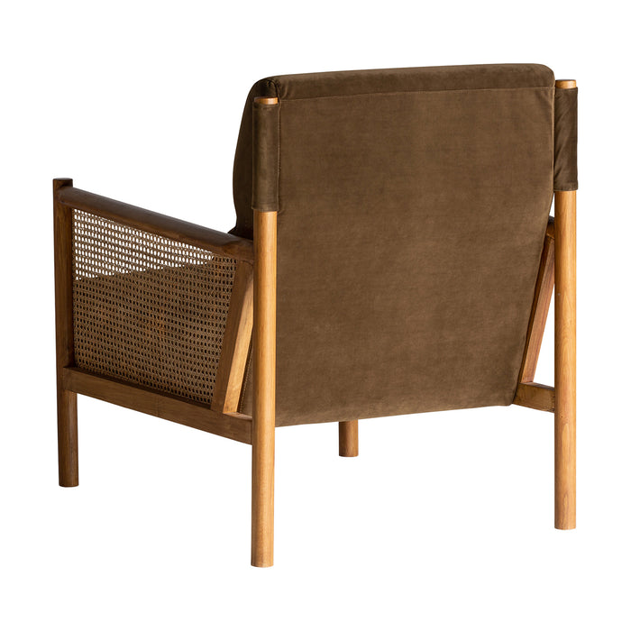 The Velburg Armchair boasts a Colonial-style design with a brown color scheme. The chair is crafted from Rattan and paired with Rubber Wood and Pine Wood for a unique and striking look