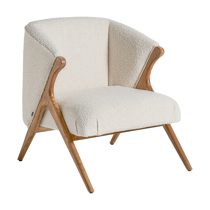 Prati Boucle armchair with ist softness and ease is a trendy piece of furniture in your home