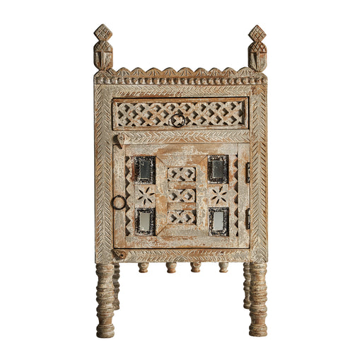 The Chaiyi Bedside Table is a stunning piece of wooden furniture, beautifully hand-carved from mango wood. Its cream color and oriental style add a touch of elegance to any bedroom