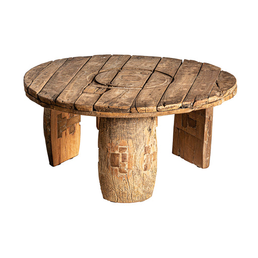 Badai Coffee Table, composed of null wood in a natural distressed hue, this ethnic-style table provides an aura of refinement to any space